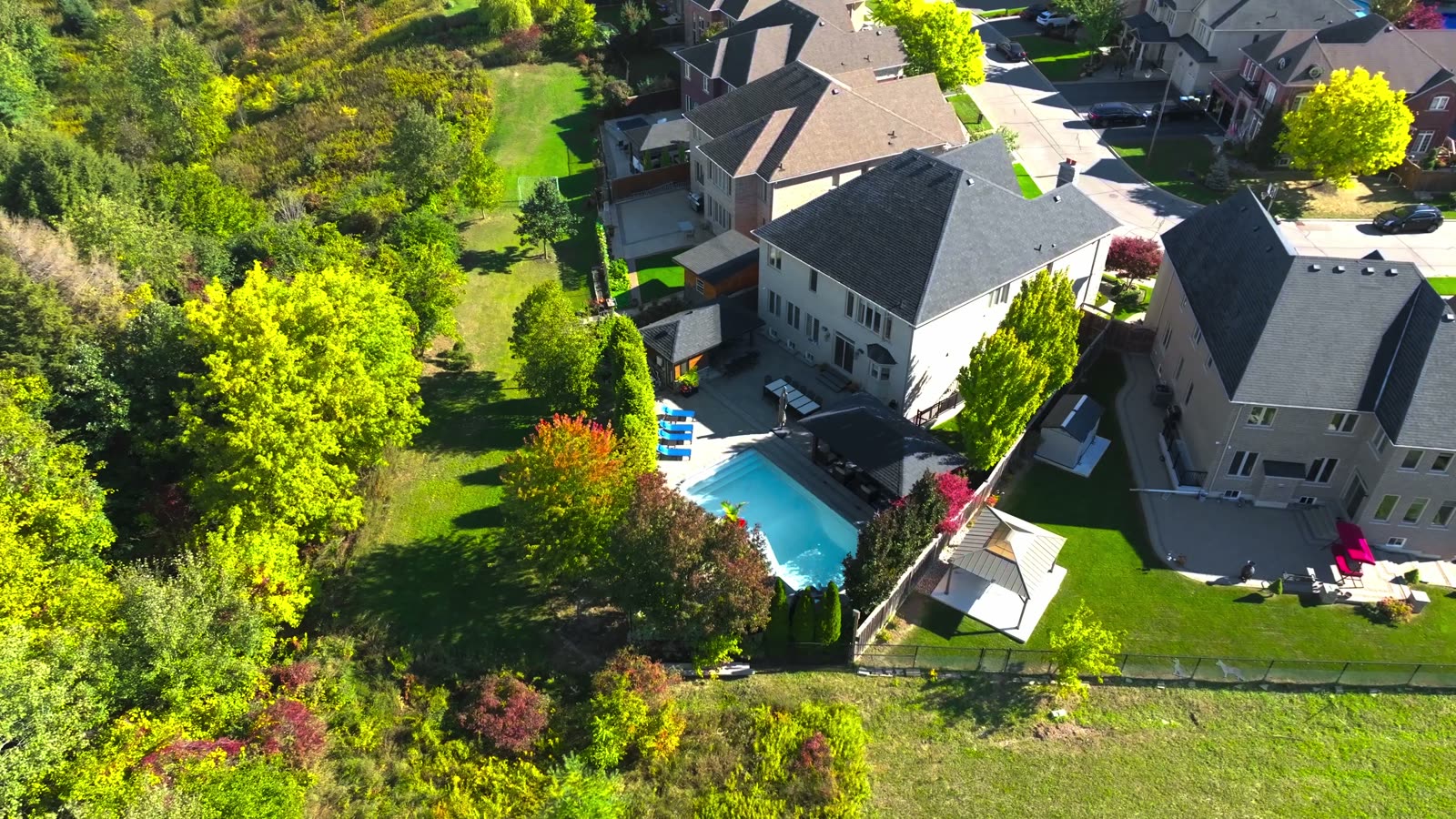 Overhead drone view of the backyard pool